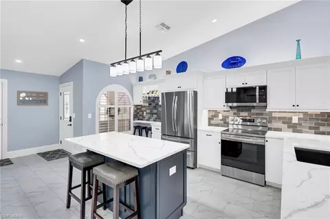 Kitchen - 8670 Mustang Dr, Naples, FL 34113 photo 2 of 3