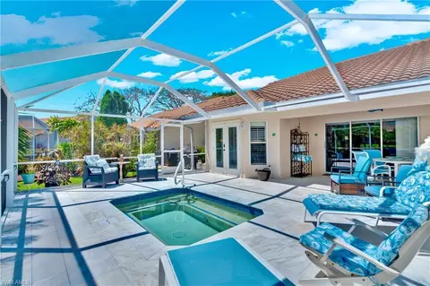 Exterior - 8670 Mustang Dr, Naples, FL 34113 photo 4 of 12