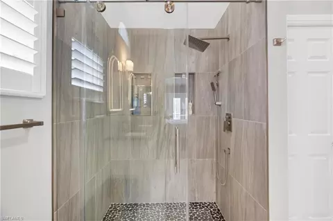 Bath - 8670 Mustang Dr, Naples, FL 34113 photo 2 of 3
