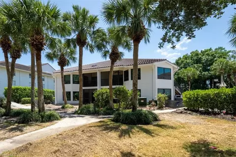 Exterior - 792 Eagle Creek Dr #101, Naples, FL 34113 photo 1 of 10