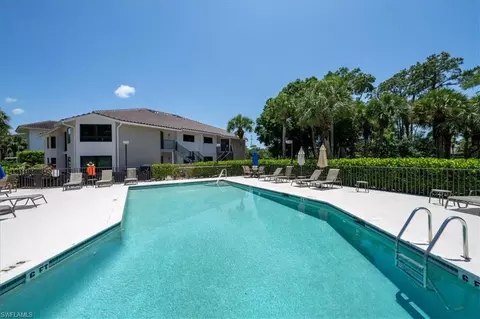 Exterior - 792 Eagle Creek Dr #101, Naples, FL 34113 photo 5 of 10