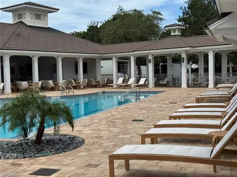 Exterior - 792 Eagle Creek Dr #101, Naples, FL 34113 photo 9 of 10