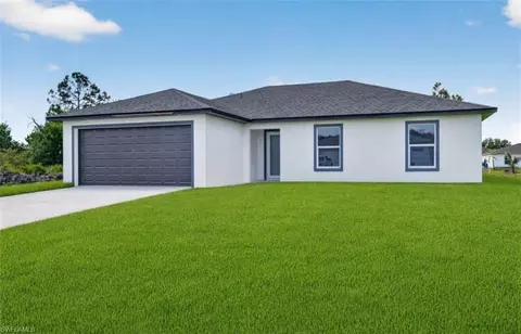 704 Carbon St E, Lehigh Acres, FL 33974