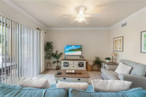 Living - 9727 Acqua Ct #436, Naples, FL 34113 photo 2 of 4