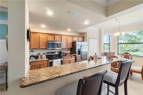 Kitchen - 9727 Acqua Ct #436, Naples, FL 34113 photo 1 of 2