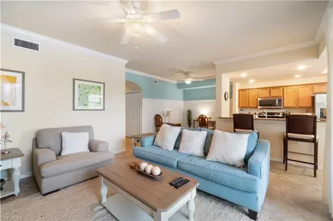 Living - 9727 Acqua Ct #436, Naples, FL 34113 photo 3 of 4