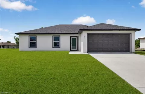 702 Carbon St E, Lehigh Acres, FL 33974