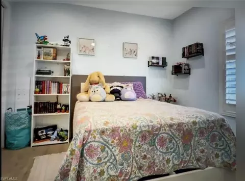 Bedroom - 2575 31st Ave NE, Naples, FL 34120 photo 4 of 9