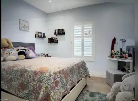 Bedroom - 2575 31st Ave NE, Naples, FL 34120 photo 3 of 9