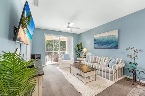 Living - 2720 Cypress Trace Cir #2935, Naples, FL 34119 photo 2 of 3