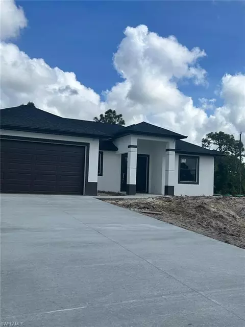 1144 Ecstasy St E, Lehigh Acres, FL 33974