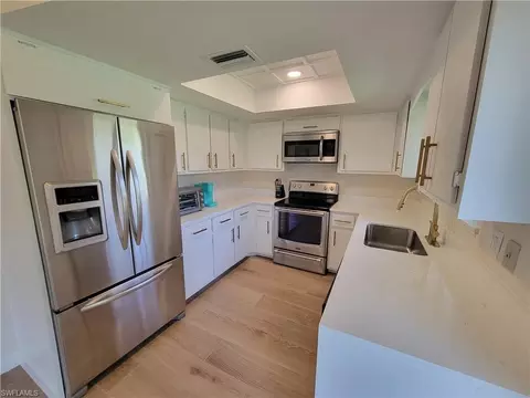 Kitchen - 809 Palm View Dr #8, Naples, FL 34110 photo 1 of 2