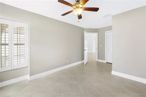 Bedroom - 10340 Regent Cir, Naples, FL 34109 photo 5 of 5