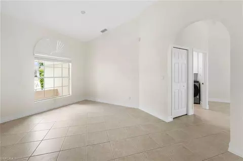 Living - 10340 Regent Cir, Naples, FL 34109 photo 2 of 10