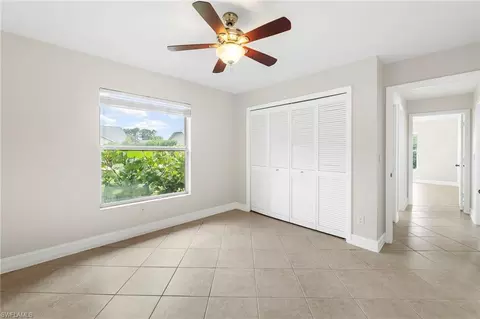 Bedroom - 10340 Regent Cir, Naples, FL 34109 photo 4 of 5