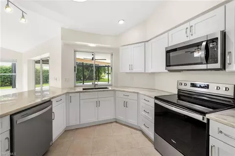 Kitchen - 10340 Regent Cir, Naples, FL 34109 photo 2 of 2