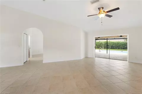 Living - 10340 Regent Cir, Naples, FL 34109 photo 1 of 10