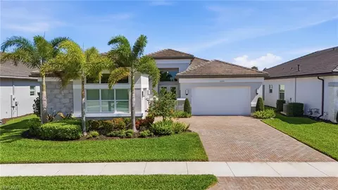 Exterior - 11644 Periwinkle Dr, Naples, FL 34120 photo 9 of 10
