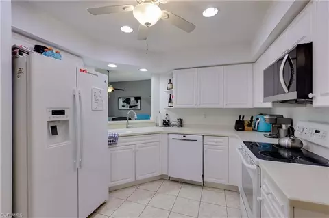 25080 Peacock Ln #102, Naples, FL 34114