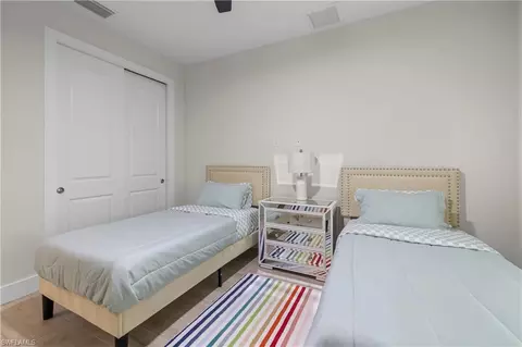 Bedroom - 3012 Pine Tree Dr, Naples, FL 34112 photo 5 of 9