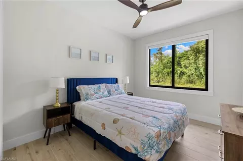 Bedroom - 3012 Pine Tree Dr, Naples, FL 34112 photo 6 of 9