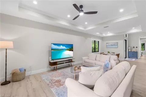 Living - 3012 Pine Tree Dr, Naples, FL 34112 photo 2 of 2