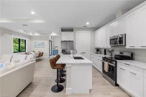 Kitchen - 3012 Pine Tree Dr, Naples, FL 34112 photo 1 of 2