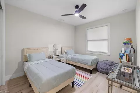 Bedroom - 3012 Pine Tree Dr, Naples, FL 34112 photo 4 of 9