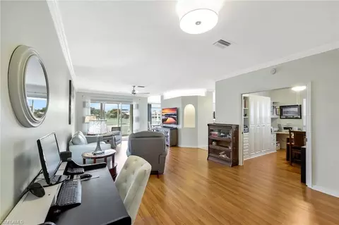 Living - 5877 Three Iron Dr #702, Naples, FL 34110 photo 1 of 4
