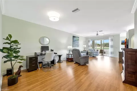 Living - 5877 Three Iron Dr #702, Naples, FL 34110 photo 2 of 4