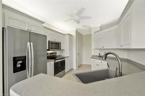 Kitchen - 5877 Three Iron Dr #702, Naples, FL 34110 photo 1 of 2