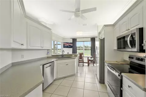 Kitchen - 5877 Three Iron Dr #702, Naples, FL 34110 photo 2 of 2