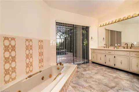 Bath - 560 Bald Eagle Dr #22, Naples, FL 34105 photo 2 of 4
