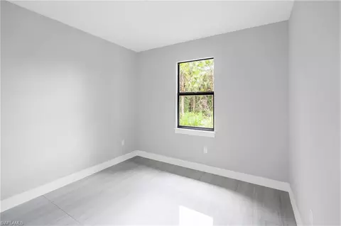 Bedroom - 4092 24th Ave SE, Naples, FL 34117 photo 2 of 5