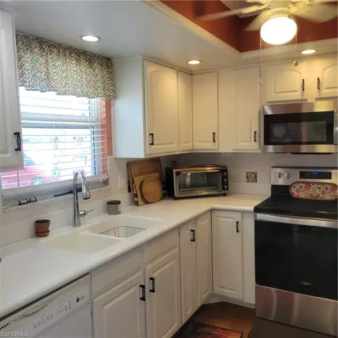 Kitchen - 200 Valley Stream Dr #4B, Naples, FL 34113 photo 2 of 2