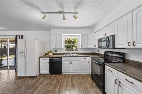 Kitchen - 4027 Mindi Ave, Naples, FL 34112 photo 2 of 4