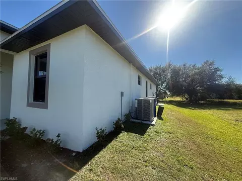 Exterior - 136-138 Pullman St, Lehigh Acres, FL 33974 photo 2 of 4