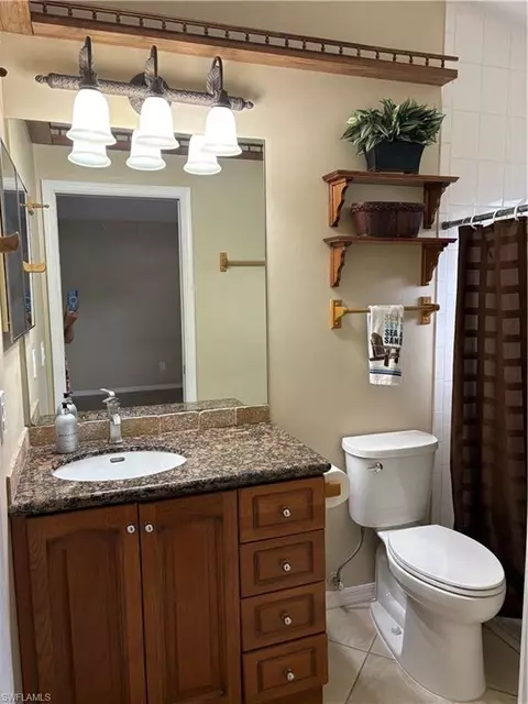 Bath - 5232 Raintree Ln, Naples, FL 34113 photo 2 of 4