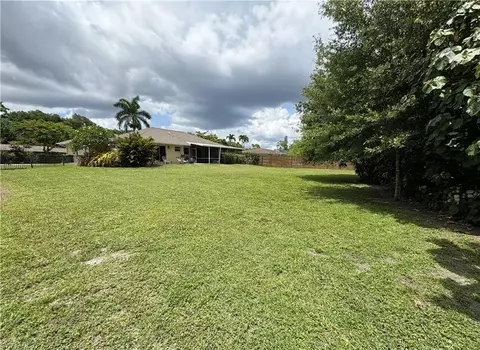 Exterior - 5232 Raintree Ln, Naples, FL 34113 photo 17 of 19