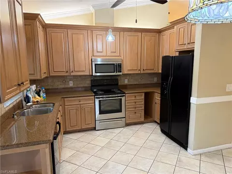 Kitchen - 5232 Raintree Ln, Naples, FL 34113 photo 1 of 3