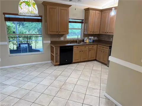 Kitchen - 5232 Raintree Ln, Naples, FL 34113 photo 2 of 3