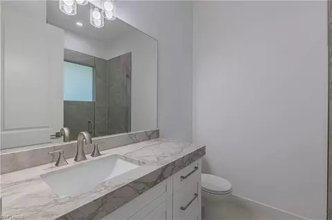 Bath - 3098 Pine Tree Dr, Naples, FL 34112 photo 4 of 5