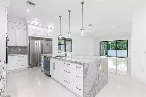 Kitchen - 3098 Pine Tree Dr, Naples, FL 34112 photo 2 of 4
