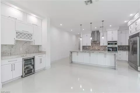 Kitchen - 3098 Pine Tree Dr, Naples, FL 34112 photo 4 of 4