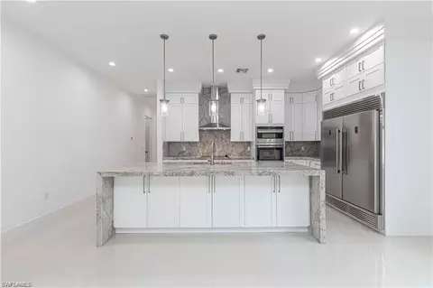 Kitchen - 3098 Pine Tree Dr, Naples, FL 34112 photo 1 of 4