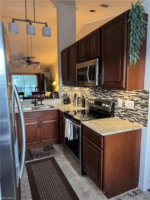 181 Grand Oaks Way #Q203, Naples, FL 34110