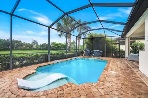 Exterior - 4118 Raffia Dr, Naples, FL 34119 photo 6 of 9