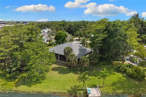 Exterior - 61 Constitution Dr, Naples, FL 34112 photo 3 of 14