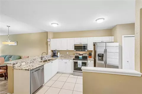 Kitchen - 9185 Celeste Dr #1-103, Naples, FL 34113 photo 2 of 3