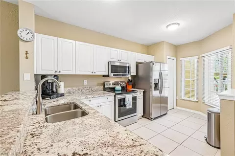 Kitchen - 9185 Celeste Dr #1-103, Naples, FL 34113 photo 3 of 3